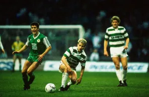 Celtic versus Hibernian Premier League football Chris Morris passes ball upfield