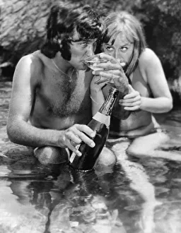 Holiday Prints: The champagne lifestyle for football star George Best seen here sipping Champagne with