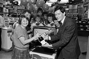 Huddersfield Prints: Champagne-style shopping - Mrs Winifred Haigh and her husband Jack (left