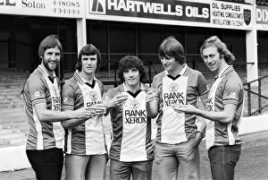 A champagne toast for Southampton FC players wearing their new Rank Xerox sponsored