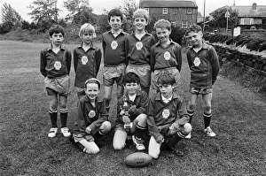We are the champions... Scholes Junior and Infants School under-nine rugby team won