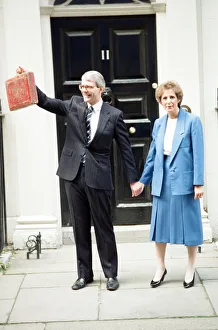 01301 Prints: Chancellor of the Exchequer John Major at 11 Downing Street with his wife Norma as he