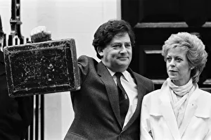 Money Prints: Chancellor of the Exchequer Nigel Lawson outside 11 Downing Street with his wife Therese