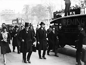Minister Prints: Chancellor of the Exchequer Winston Churchill carrying his dispatch case on his way to