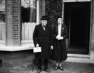 Minister Prints: Chancellor of the Exchequer Winston Churchill poses with his wife Clementine