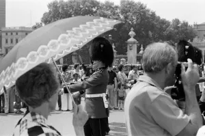 Changing of the Guard in London today. The Guards begin to wilt at the knees in the hot