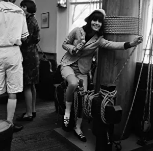 Chantal Goya, (sitting by the mast) young French pop star pictured at the Bagatel French