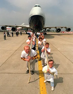 World Record Prints: Charity Aircraft Pull. A British Airways Boeing 747 Jumbo Jet is pulled along the tarmac