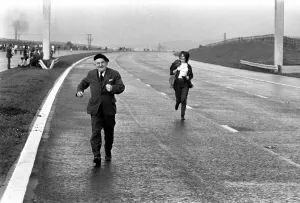Motorways Prints: Charity: Walking. Off on the M61 the walkers set off on a sponsored walk to help raise