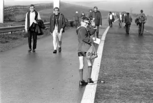 Charity: Walking. Off on the M61 the walkers set off on a sponsored walk to help raise