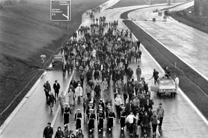 Charity: Walking. Off on the M61 the walkers set off on a sponsored walk to help raise