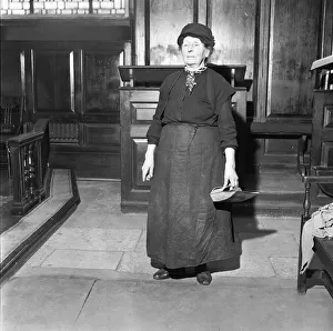 The charlady of St Martin in the Field seen here cleaning the altar shortly before a