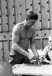 Charles Bronson June 1966 dealing cards in the film The Dirty Dozen