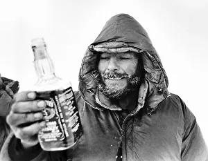 Whiskey Prints: Charles Burton North Pole Expedition takes a rest with a drink from a bottle of Jack