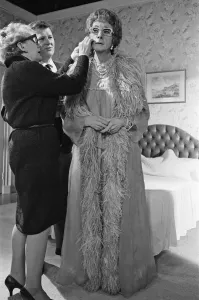 Charles Hawtrey (left) and Sid James (right) filming Carry On Again Doctor