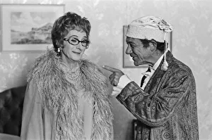 Charles Hawtrey (left) and Sid James (right) filming Carry On Again Doctor