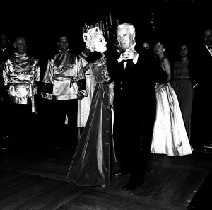 Charlie Chaplin actor dancing at the Ice Ball in Paris December 1954