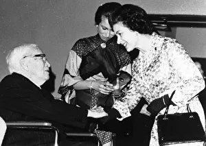 Comedians Prints: Charlie Chaplin Silent Movie Star Comedy Actor meeting the Queen Elizabeth after