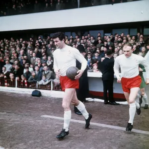 00268 Prints: Charlie Hurley captain Sunderland leading team onto football pitch Circa