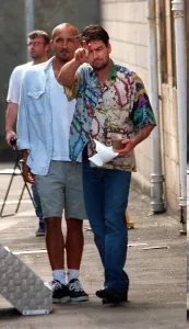 Crew Prints: CHARLIE SHEEN ACTOR FILMING JULY 1996 AT CLYDEBANK TOWN HALL NEAR GLASGOW WITH CUP