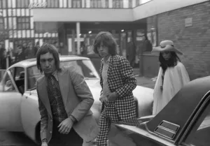 Charlie Watts, Mick Jagger and his girlfriend Bianca De Macias arrive at Coventry Theatre
