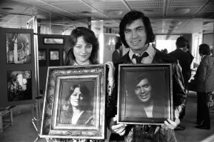 Charlotte Rampling and Engelbert Humperdinck with their portraits at a celebrity portrait