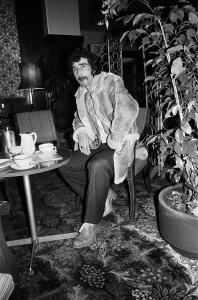 Moustaches Prints: Charlton Athletic footballer Derek Hales pictured having tea after having a meeting