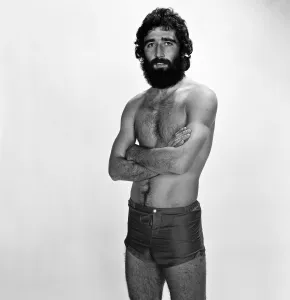 00571 Prints: Charlton Athletic footballer Derek Hales poses in the Mirror studio. December 1976