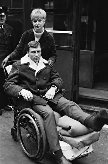 Wheelchair Prints: Charlton Athletic footballer Mike Bailey returns to London with his wife after breaking
