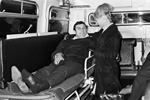 Charlton Athletic footballer Mike Bailey returns to London with his wife after breaking