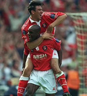 Charlton Athletic footballer Richard Rufus celebrates with team mate Steve Jones after