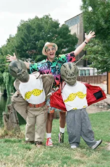 01381 Prints: Chart topper Timmy Mallett with two martians sporting itsy bitsy bikinis