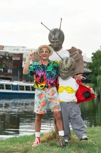 01381 Prints: Chart topper Timmy Mallett with two martians sporting itsy bitsy bikinis