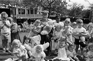 Teddy Bears Prints: This cheerful group of toddlers from Quarry Hill playgroup found a new friend in Mr