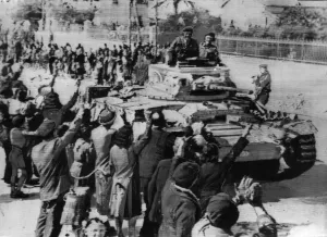 Cheering crowds line the streets of Sfax to welcome 8th Army tanks