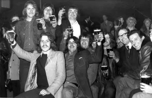00088 Prints: Cheers, Lads! It may be cold, it may be raining outside but these festival goers seem