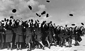 Cheers from Wrens at Devonport Dockyard, Plymouth, following the Commanders statement