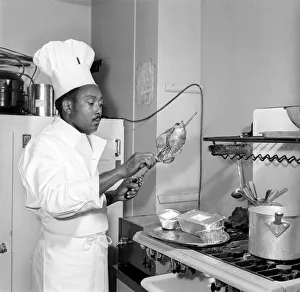 The Chef at the Romains Buttery seen here in the kitchen preparing meals that are ordered