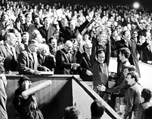 Chelsea captain Ron Harris lifts the FA Cup after they had beaten Leeds at Old Trafford