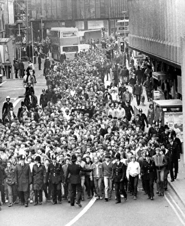 Chelsea football fans are escorted along New Bridge Street in Newcastle by police 27