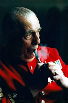 Core07 Prints: Chelsea Pensioner Ray Wanless lights up his pipe at The Royal Hospital
