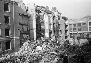 01488 Prints: Chelsea residents with the few belonging salvaged from their bombed out following a raid