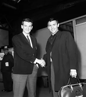 Chelsea teamates Eddie McCreadie (left) and Barry Bridges shake hands having just heard