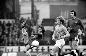 Kicking Prints: Chelsea v. Huddersfield. Tony Potrac tries to scissor-kick the ball over defender Hutt as