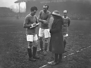 00230 Prints: Chelsea v. Newcastle. Chelsea players signing autograph book. 7th February 1921