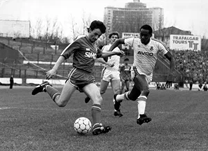 Chelsea v. West Ham Pat Nevin shoots as Parris of West Ham challenges