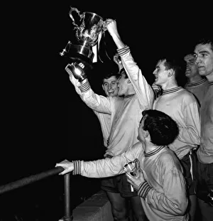 Chelseas Terry Venables holds up the League Cup after they had beaten Leicester City