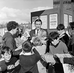 Chelseas transfer listed centre forward Barry Bridges surrounded by autograph