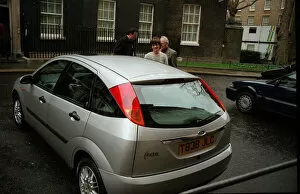 00066 Collection: Cherie Blair leaving Downing Street in her Ford Focus