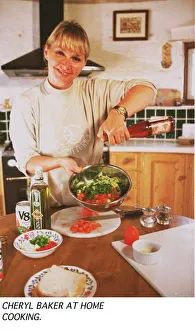 Cheryl Baker TV Presenter busy cooking in the kitchen of her house